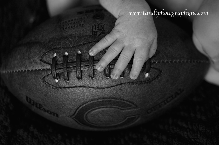 Raleigh Newborn Photographer black and white with Chicago Bears football