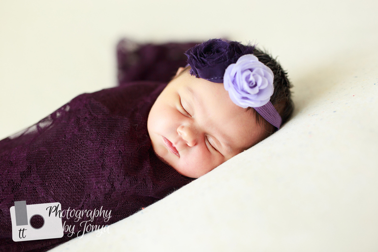 Newborn photographer in Holly Springs with newborn baby girl